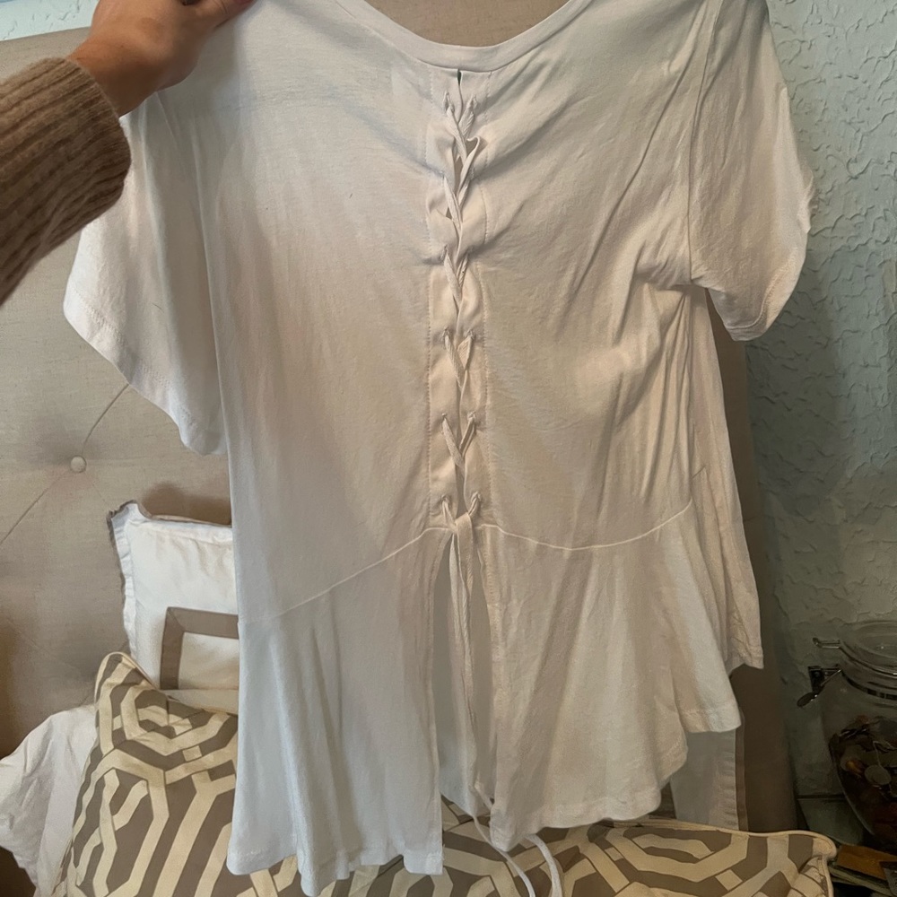 Others follow white top tie in back